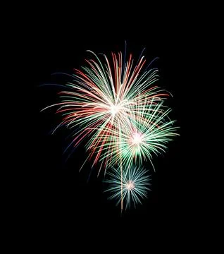 Colorful fireworks exploding on black sky. Stock Photos