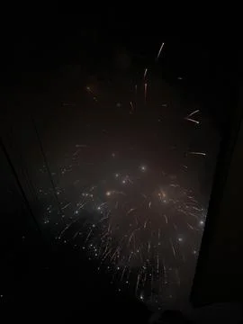 Colorful Fireworks Exploding In Dark Sky At Night Stock-Fotos