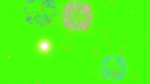 Colorful fireworks exploding on green background Stock Footage 336940779