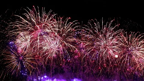 Colorful fireworks exploding in the night sky. Celebrations and events in bri Video stock 92369883