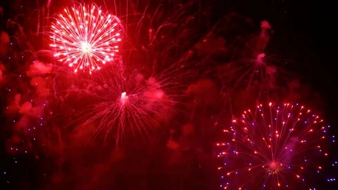 Colorful fireworks exploding in the night sky. Celebrations and events in bri Stockbeeldmateriaal 92369941