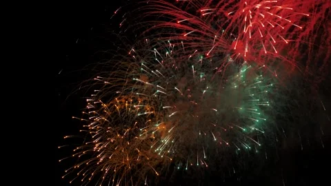 Colorful fireworks exploding in the night sky during a celebration Stock Footage 312314388