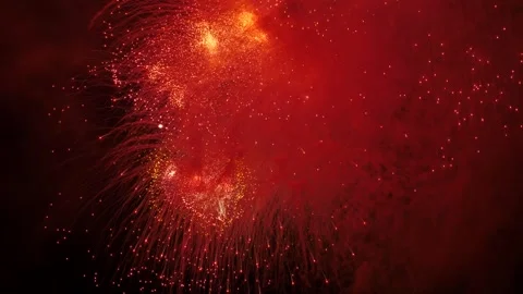 Colorful fireworks exploding in the night sky, creating a mesmerizing spectacle Video stock 312898424