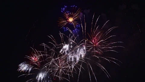 Colorful Fireworks Exploding in the Night Sky. Stockbeeldmateriaal 345143270