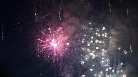 Colorful fireworks exploding in the night sky during a celebration Foto stock