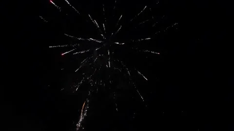 Colorful fireworks exploding in the nighttime sky outdoors 库存影片 342027055
