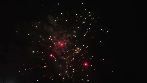 Colorful Fireworks Exploding Over Dark Night Sky with Sparks Vídeos de archivo 337414055