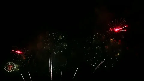 Colorful fireworks exploding with shining in annual festival Stock Footage 163736811