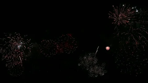 Colorful fireworks exploding with shining in annual festival Stock Footage 163737034