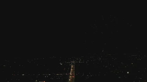 Colorful fireworks exploding in the sky above the city. Aerial view of the city 스톡 동영상 151247708