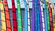 Colorful Flags Fluttering On The Background Of A Large River Stock Footage