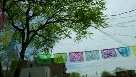 Colorful Flags over Sidewalk Stock Footage 277423512