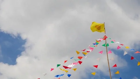Colorful flags in the templ with blue sky background. Stockbeeldmateriaal 72450198