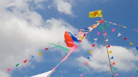 Colorful flags in the templ with blue sky background. Stockbeeldmateriaal 72450200