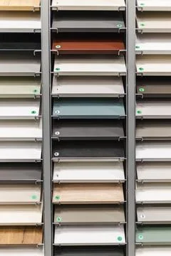 Colorful Flooring and Surface Samples on Vertical Display Racks Stock Photos
