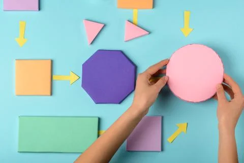 Colorful flow process chart concept. Hands putting a circle in the graph Stock Photos