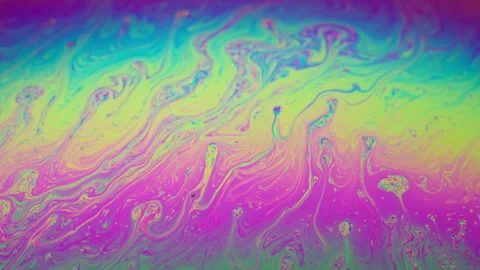 Colorful, flowing liquid with a rainbow effect. 動画素材 307438230