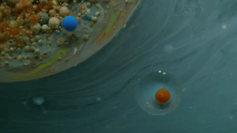 Colorful fluid marble bubbles stream ink drops Video stock 318304316