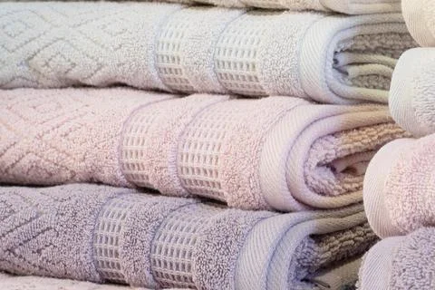 Colorful folded towels stack closeup picture. Foto stock