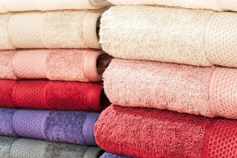 Colorful folded towels stack closeup picture. Foto stock