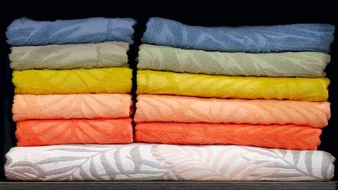 Colorful folded towels stack closeup picture, hotel service concept Foto stock