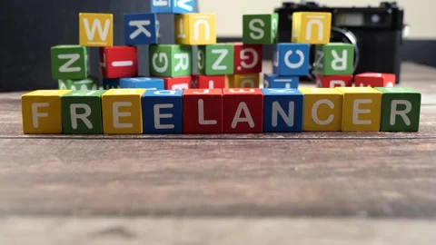 Colorful freelancer workspace with blocks and camera Stock Footage 305871517
