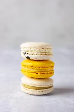 Colorful French macarons stack on the table Stock Photos
