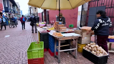 Colorful Fresh Fruit and Vegetable Stand on a Bogota Street Corner Stock Footage 334576183