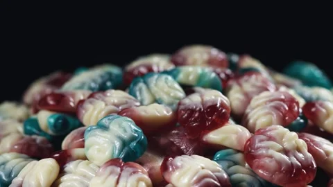 Colorful fruit jelly candy in the shape of brain Stock Footage 314773712