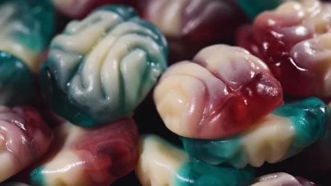 Colorful fruit jelly candy in the shape of brain Stock Footage 314773764