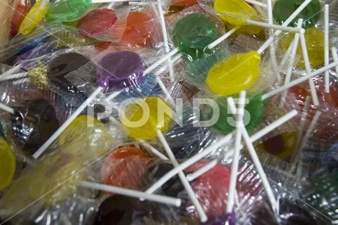 Colorful fruit lollipops Stock Photos