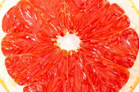 Colorful fruit pattern of fresh grapefruit slices Stock Photos