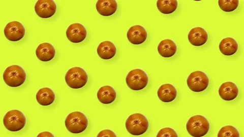 Colorful fruit pattern of fresh grapefruits on yellow background. Seamless Stock Footage 167479031