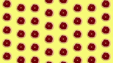 Colorful fruit pattern of fresh grapefruits on yellow background. Seamless Stock Footage 167484637