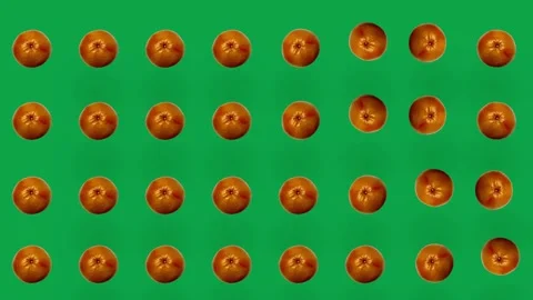 Colorful fruit pattern of fresh grapefruits on green background. Seamless Video stock 167485968