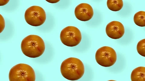 Colorful fruit pattern of fresh grapefruits on blue background with shadows Stock Footage 167487575