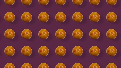Colorful fruit pattern of fresh grapefruits. Top view. Seamless pattern with Video stock 167488080