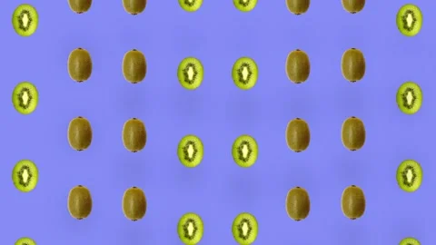 Colorful fruit pattern of fresh kiwi on purple background. Seamless pattern with Stock Footage 167484420