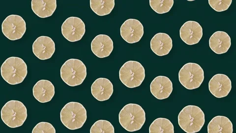 Colorful fruit pattern of fresh lemons on green background with shadows Stock Footage 167479206