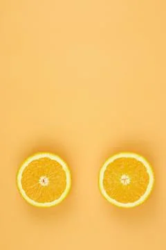 Colorful fruit pattern of fresh orange slices on pastel color background. Vie Stock Photos