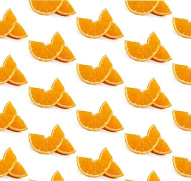 Colorful fruit pattern of fresh orange slices on background. From top view Stock Photos