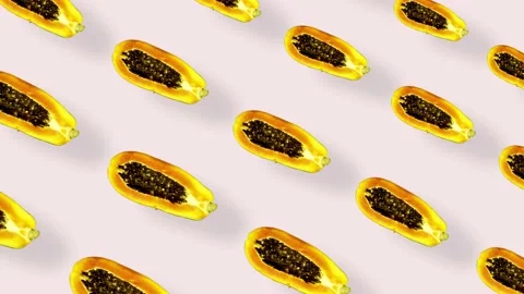 Colorful fruit pattern of fresh papaya on pink background with shadows. Seamless Stock Footage 167487147