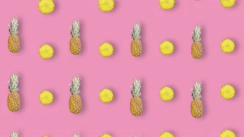 Colorful fruit pattern of fresh pineapple on pink background. Seamless pattern 動画素材 167486024