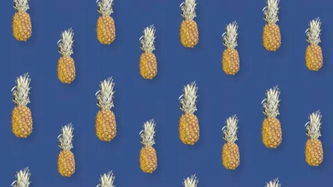 Colorful fruit pattern of fresh pineapple on blue background with shadows Stock Footage 167487656