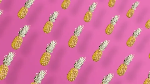 Colorful fruit pattern of fresh pineapple on pink background with shadows 動画素材 167487682