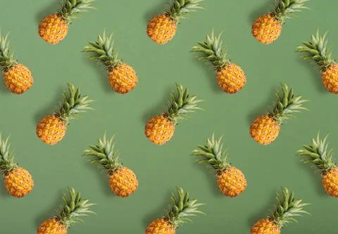 Colorful fruit pattern of fresh pineapples Stock Photos