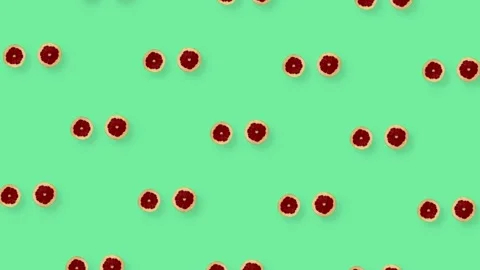 Colorful fruit pattern of fresh rotating grapefruits on green background Stock Footage 167475349