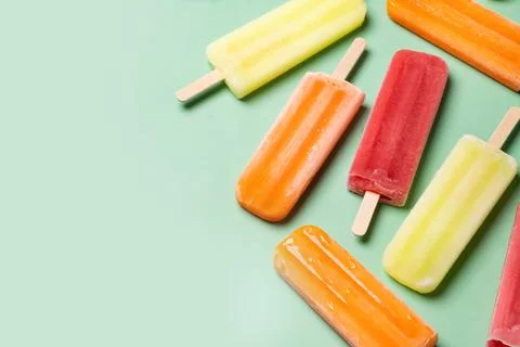 Colorful fruit popsicles Stock Photos