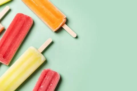 Colorful fruit popsicles Stock Photos