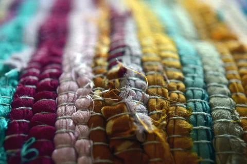 Colorful garment close up. Abstract background textile texture. Stock Photos